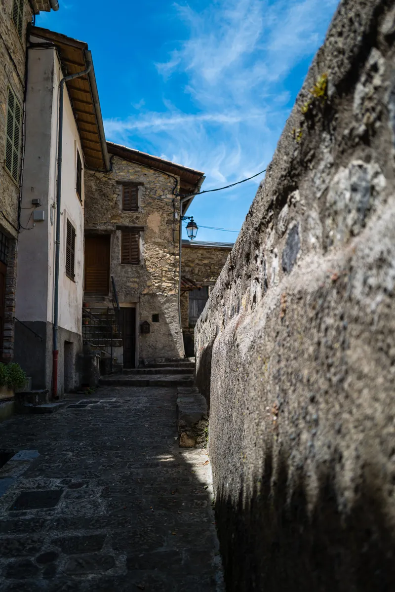 Medieval stone building and mountain sky in Marie, Alpes-Maritimes, Leica Q2