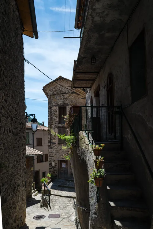 Sunlit stone facade in Marie perched village, Alpes-Maritimes, Leica Q2