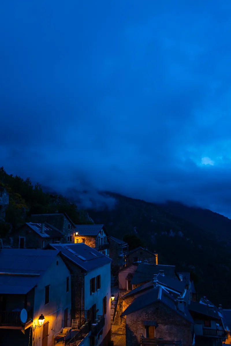Stone building and lamppost in Roubion village after dark, Alpes-Maritimes, Leica Q2
