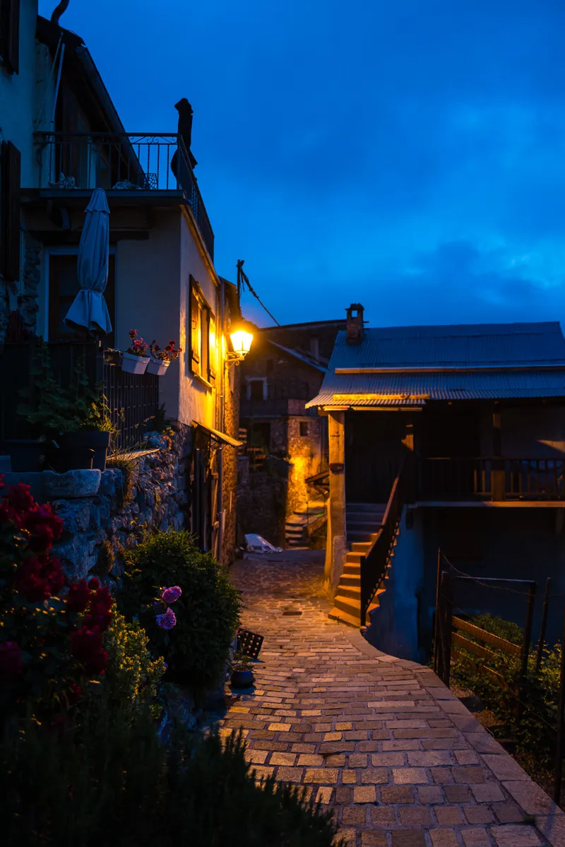 Stone facade and closed shutters in Roubion village at night, Alpes-Maritimes, Leica Q2