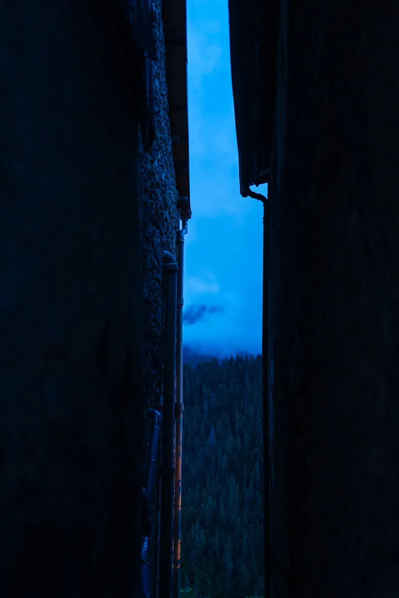 Lamplight on a medieval stone passage in Roubion village at night, Alpes-Maritimes, Leica Q2