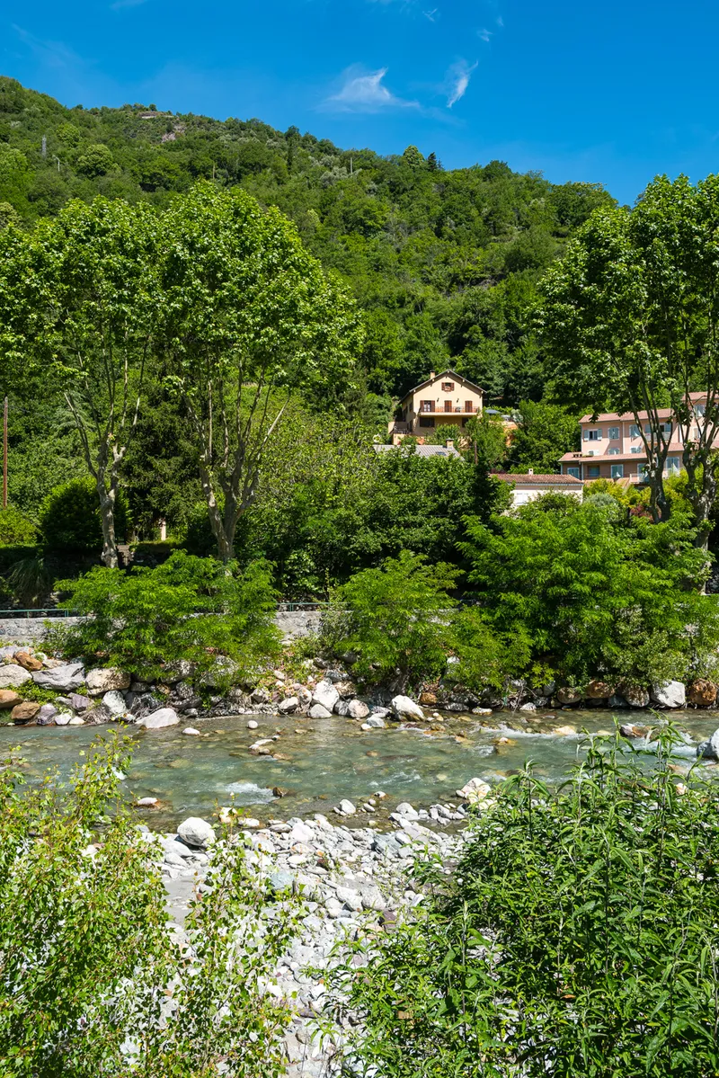 Stone buildings and mountain backdrop in Saint-Sauveur-sur-Tinée, Alpes-Maritimes, Leica Q2