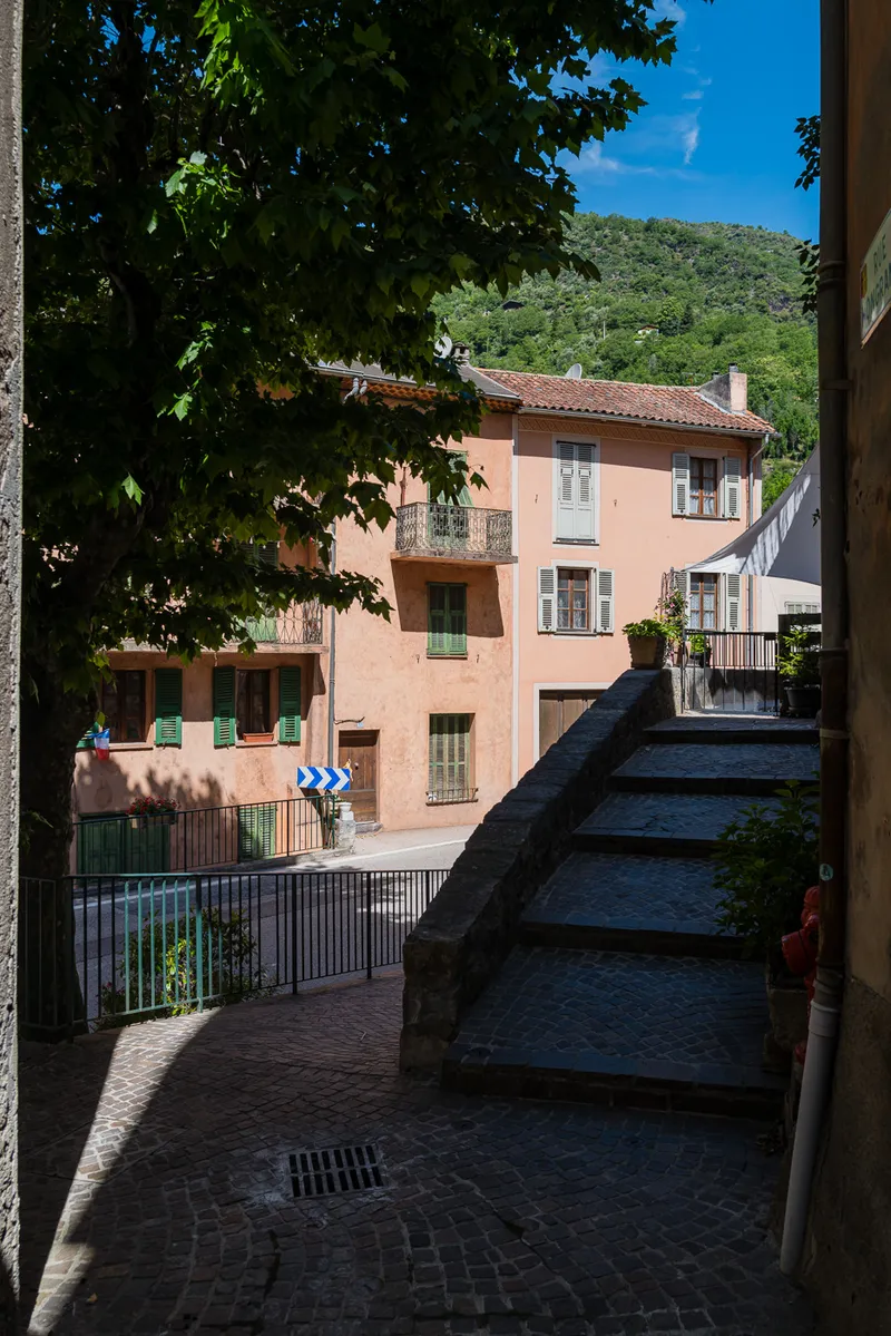 Stone facade and arched passage in Saint-Sauveur-sur-Tinée, Alpes-Maritimes, Leica Q2